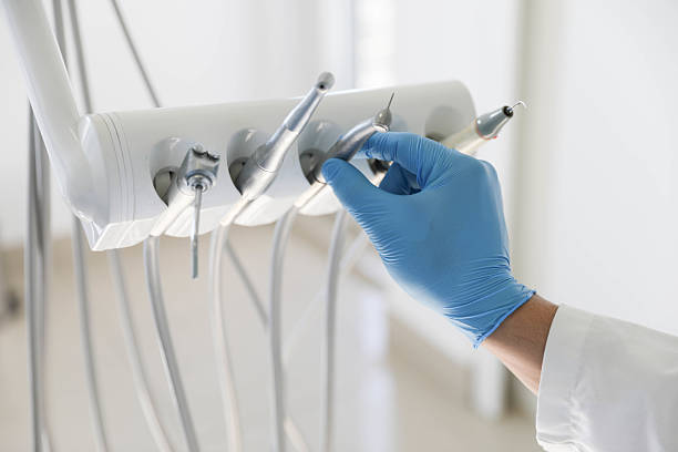 Professional Tooth Extraction technician working in Fennville, MI